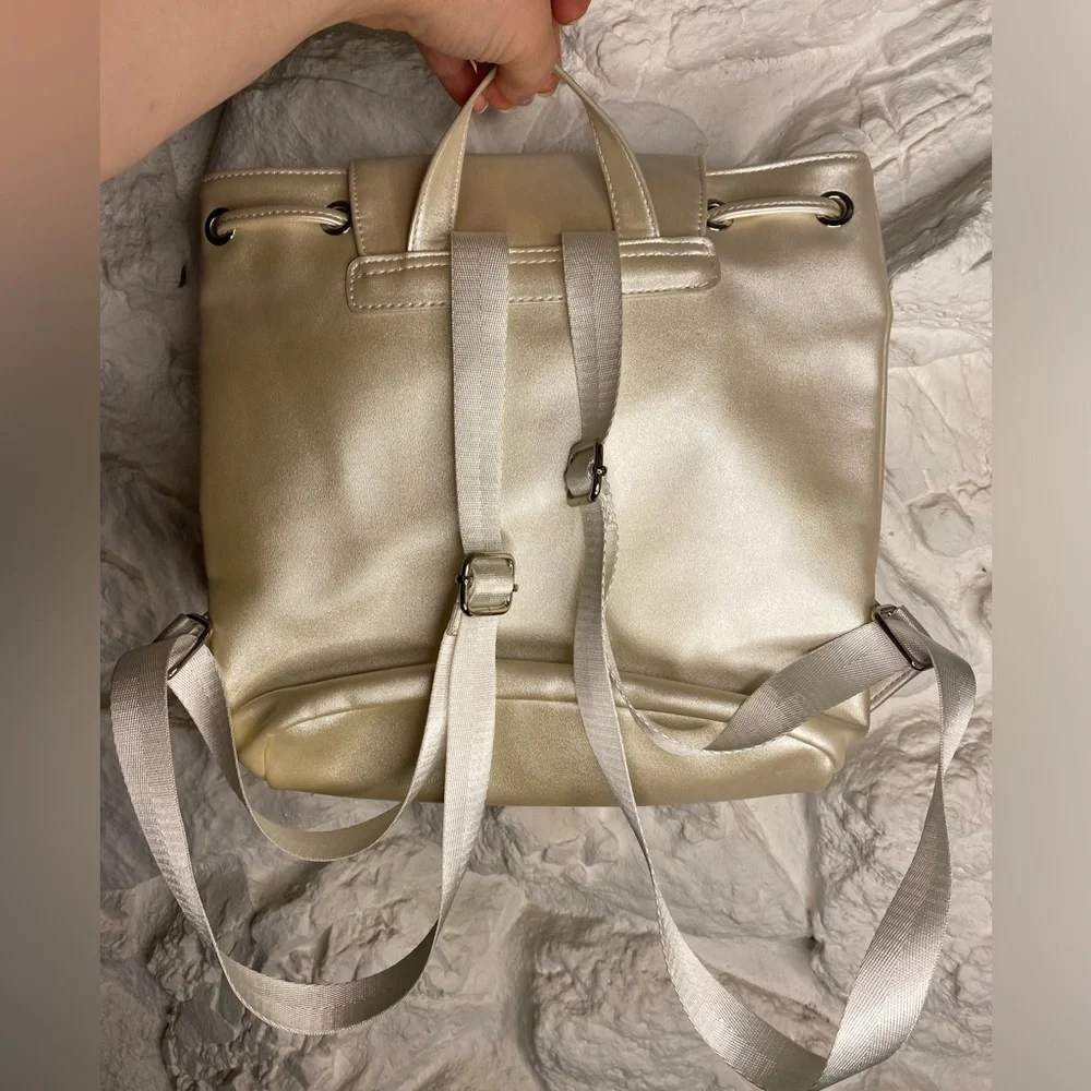 NWT UO IRIDESCENT CREAM BACKPACK